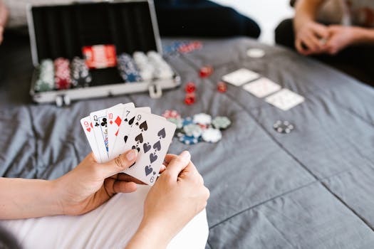 Focused poker player studying strategies