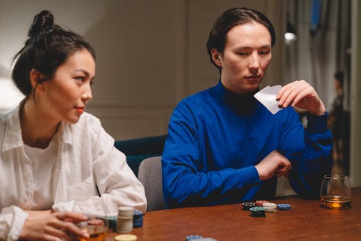 Poker players engaged in a tense game