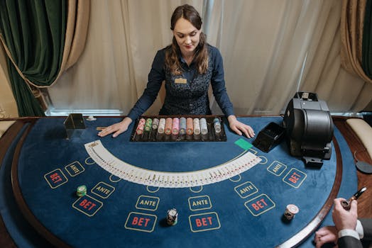 professional dealing at a poker table